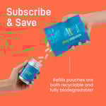 A woman pours capsules from a biodegradable refill pouch into a bottle